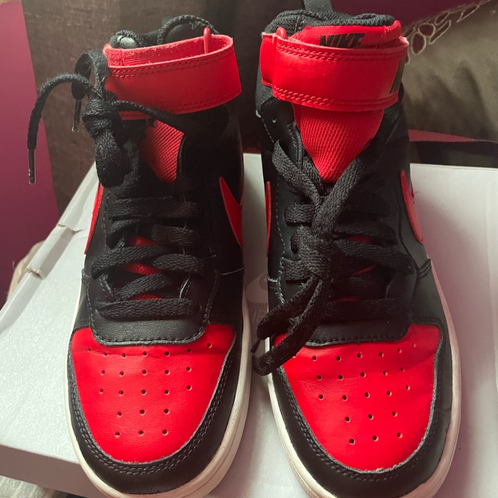 Black and red Nikes